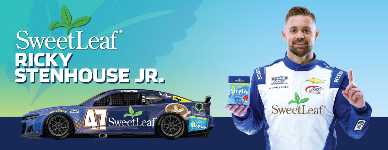 A hero shot of the SweetLeaf Camaro with Ricky Stenhouse Jr. Ricky Stenhouse Jr. stands in front of the Sweetleaf Camaro holding Sweetleaf Stevia partnership with Kroger. JTG RACING