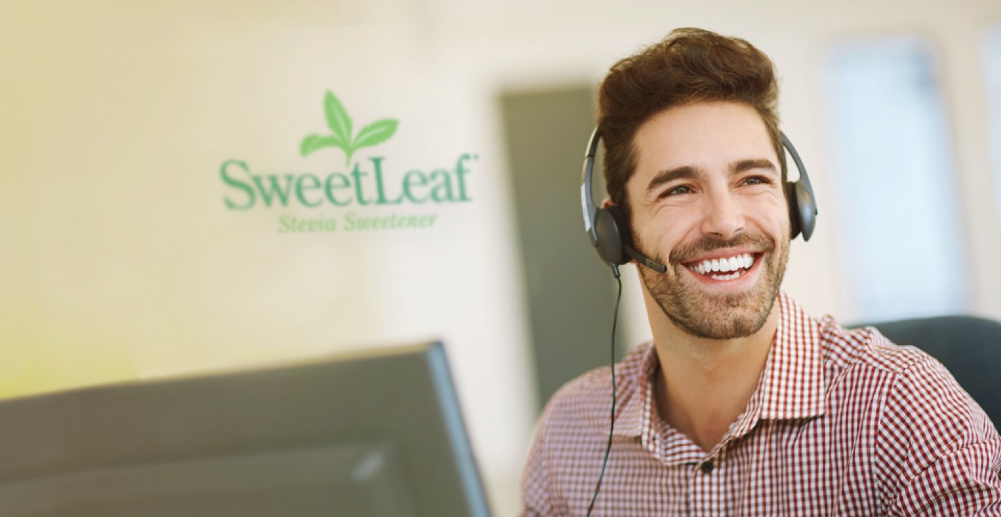 a man with a headset on taking calls for sweetleaf as a customer service representative